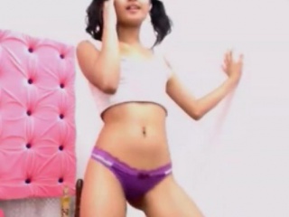 Pretty brunette teen dancing on webcam