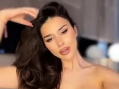 Busty Babe Playing With Her Big Boobs